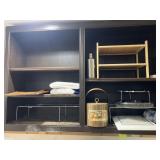 Lot of kitchen items on shelves, bring boxes