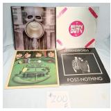 Four Vintage Vinyl Records