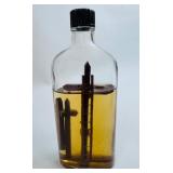 CROSSES IN A BOTTLE