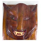 CARVED PLAQUE OF A JAGUAR