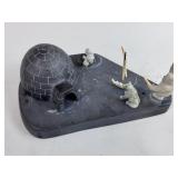 INUIT CARVING OF A FISHERMAN OUTSIDE HIS IGLOO