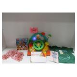 Light-up Toy - Top 12m - Book & More