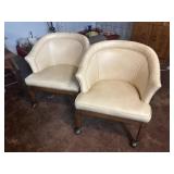 PAIR OF VINTAGE ROLLING ARM CHAIRS