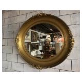 LARGE GILT FRAMED OVAL MIRROR