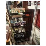 COLLECTION OF AUTO LICENSE PLATES WITH RACK