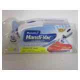 Reynold's Handi Vacume Sealer w/Knife Sharpener Reynold's Handi Vacume Sealer w/Knife Sharpener