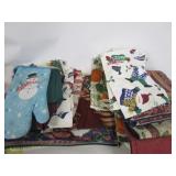 Lots Of Holiday Placemats And Oven Mits