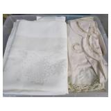 Tote Full Of Table Cloths