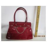 Says Gucci Purse,Could Be Knock Off