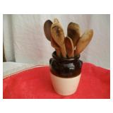 Pottery Jug With Wooden Spoons