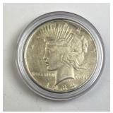 1934-D Peace Silver Dollar in Capsule