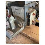 10" RADIAL ARM SAW ON TABLE WITH WHEELS