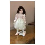 Old vintage baby doll on stand Old vintage baby doll on stand