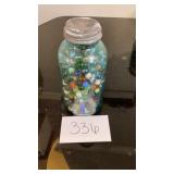 Glass jar full of vintage marbles Glass jar full of vintage marbles