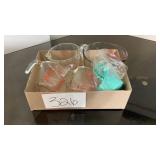 Four Pyrex glass measuring cups and Farberware Four Pyrex glass measuring cups and Farberware
