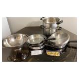 Miscellaneous pots and pans, colander, corn on Miscellaneous pots and pans, colander, corn on