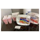 Two large popcorn tubs and four small popcorn Two large popcorn tubs and four small popcorn