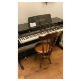 53in x 34in x 23in electric piano with chair 53in x 34in x 23in electric piano with chair