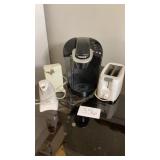 Keurig coffee maker, rival toaster, and two Keurig coffee maker, rival toaster, and two