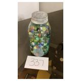 Glass jar full of vintage marbles Glass jar full of vintage marbles