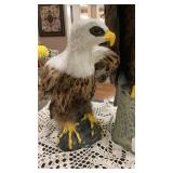 2 small real feathered eagle statues, one bug 2 small real feathered eagle statues, one bug