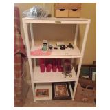 Plastic four shelf unit, items on the shelves not