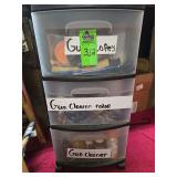 Plastic 3 drawer storage bin with contents. Gun cleaning materials