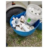 assorted PVC plumbing fittings and pipe scraps
