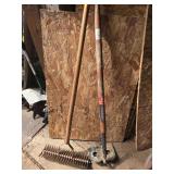 Mortar hoe and gravel rake