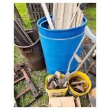 Barrel, garbage can, buckets with contents