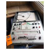 vintage Conar Instruments Model 221 tube tester and vintage Triplett Model 3432-A radio frequency (RF) signal generator