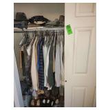 Contents of left side closet. Men's shoes size 8.5/9, mens clothing size medium and large
