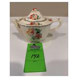 Alfred making , Marigold teapot ￼ from England ￼