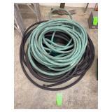 Four garden hoses