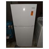 Small Frigidaire fridge and top freezer