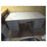 Large metal desk with rolling chair