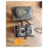The Graflex 22 Model 200 is a vintage twin-lens reflex (TLR) medium format camera