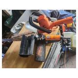 Electric chainsaw and hedge clippers