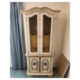 Vintage French Provincial style two-piece china hutch with a distressed antique white and gold finish.