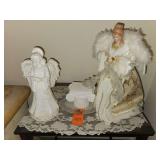 Angels and Greek colomn stand