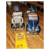 vintage 1931 Ford Model A Roadster and 1936 Ford Deluxe Cabriolet Model