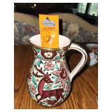 vintage hand-painted ceramic water pitcher or ewer featuring a deer and floral motif, by Ikaros Pottery in Rhodes, Greece