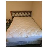 Full-size bed with mattress and boxspring