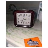 vintage red-tinted translucent case battery alarm clock made by Ruiwang