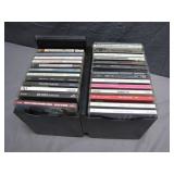 34 CD's in Holder