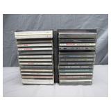 34 CD's in Plastic Holder