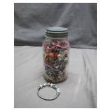 Jar of Mixed Jewelry and Beaded Bracelet