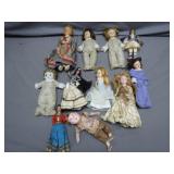 11 Assorted Dolls with Clothing
