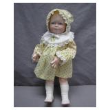 Charming Vintage Porcelain Doll in Yellow