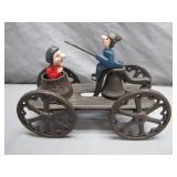 Cast Iron Toy with Riders on Wheels
